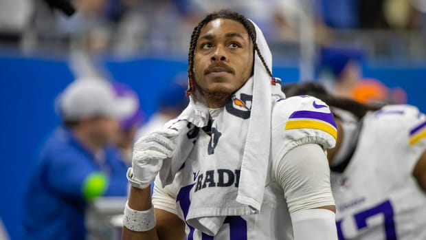 Minnesota Vikings wide receiver Justin Jefferson (18) looks at the big screen during second half of the game against the Detroit Lions at Ford Field.